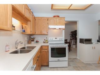 Photo 10: 102 5375 205 Street in Langley: Langley City Condo for sale in "GLENMONT PARK" : MLS®# R2053882