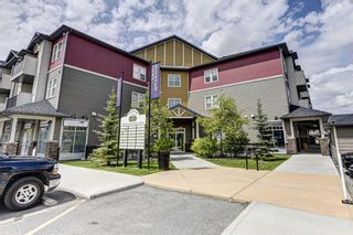 Photo 1: 9214 101 Sunset Drive: Cochrane Apartment for sale : MLS®# A1230776