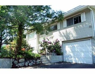 Photo 1: 2341 COMO LAKE Avenue in Coquitlam: Chineside House for sale : MLS®# V650938