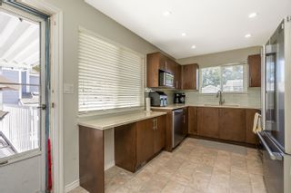 Photo 14: 12953 GLENGARRY Crescent in Surrey: Queen Mary Park Surrey House for sale : MLS®# R2876853