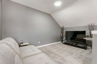 Photo 18: 7 51 West Coach Manor SW in Calgary: West Springs Row/Townhouse for sale : MLS®# A2051975