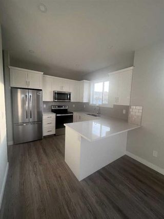 Photo 7: 6301 58A Street: Rocky Mountain House Semi Detached (Half Duplex) for sale : MLS®# A2109083