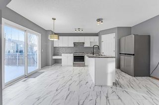 Photo 6: 64 Bridlewood Gardens SW in Calgary: Bridlewood Detached for sale : MLS®# A2098635
