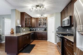 Photo 9: 48 Arbour Crest Court NW in Calgary: Arbour Lake Detached for sale : MLS®# A2128573