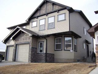 Photo 1: 766 LUXSTONE Gate SW: Airdrie Residential Attached for sale : MLS®# C3414751