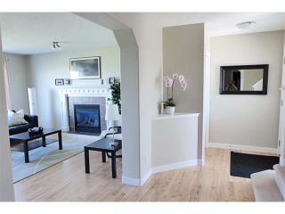 Photo 4: 772 LUXSTONE Landing SW: Airdrie House for sale : MLS®# C4016201