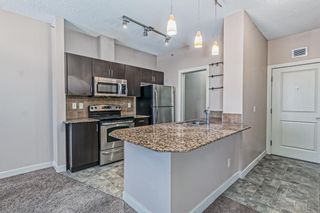 Photo 1: 321 2727 28 Avenue SE in Calgary: Dover Apartment for sale : MLS®# A2022433