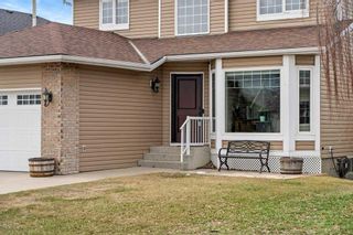 Photo 2: 1555 Meadowbrook Drive SE: Airdrie Detached for sale : MLS®# A2121076