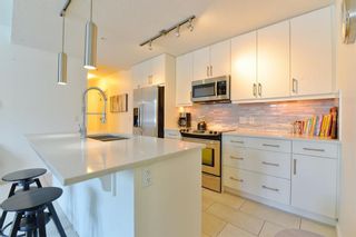 Photo 3: 206 1320 1 Street SE in Calgary: Beltline Apartment for sale : MLS®# A2023089