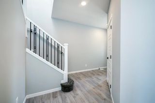 Photo 4: 38 Wolf Hollow Way SE in Calgary: C-281 Detached for sale : MLS®# A1013353