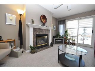Photo 2: 2115 303 ARBOUR CREST Drive NW in Calgary: Arbour Lake Condo for sale : MLS®# C4092721