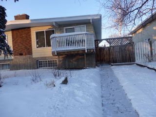Photo 1: 71 Queen Isabella Close SE in Calgary: Queensland Semi Detached for sale : MLS®# A1169583