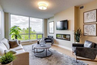 Photo 3: 109 15 Cougar Ridge Landing SW in Calgary: Patterson Apartment for sale : MLS®# A2060663