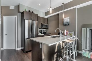 Photo 6: 411 28 Auburn Bay Link SE in Calgary: Auburn Bay Apartment for sale : MLS®# A2015310