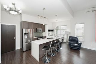 Photo 1: C404 20211 66 Avenue in Langley: Willoughby Heights Condo for sale in "Elements" : MLS®# R2875443