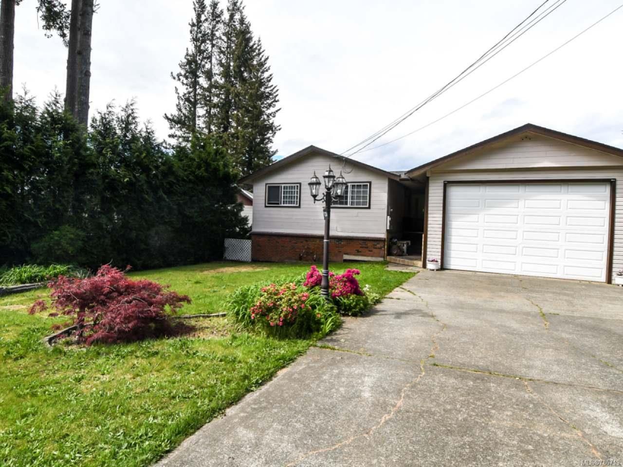 Main Photo: 1234 Denis Rd in CAMPBELL RIVER: CR Campbell River Central House for sale (Campbell River)  : MLS®# 786719