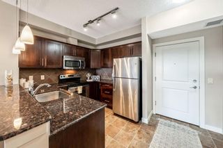 Photo 4: 417 201 Sunset Drive: Cochrane Apartment for sale : MLS®# A1245590