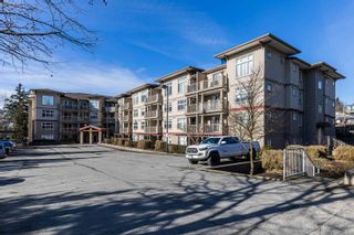 Photo 1: 201 2515 PARK Drive in Abbotsford: Central Abbotsford Condo for sale in "VIVA ON PARK" : MLS®# R2651758