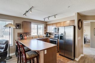 Photo 16: 1204 92 Crystal Shores Road: Okotoks Apartment for sale : MLS®# A1083634