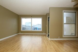 Photo 5: 563 Abinger Road NE in Calgary: Abbeydale Row/Townhouse for sale : MLS®# A1187799