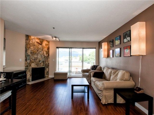Main Photo: 203 2295 PANDORA Street in Vancouver: Hastings Condo for sale in "PANDORA GARDENS" (Vancouver East)  : MLS®# V971405