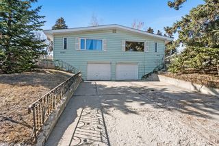 Photo 1: 1407 Rosehill Drive NW in Calgary: Rosemont Full Duplex for sale : MLS®# A2041269