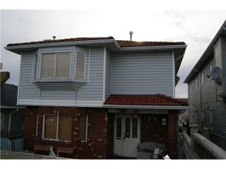 Photo 1: 7327 FRASER Street in Vancouver: South Vancouver 1/2 Duplex for sale (Vancouver East)  : MLS®# V843279