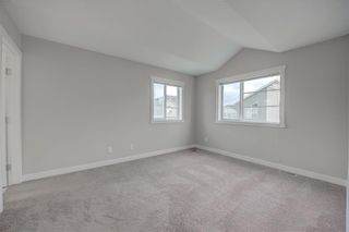 Photo 16: 405 Redstone View NE in Calgary: Redstone Row/Townhouse for sale : MLS®# A1224923