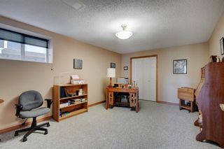 Photo 23: 65 Strathearn Gardens SW in Calgary: Strathcona Park Semi Detached for sale : MLS®# A1240835