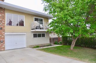 Photo 1: 614 Southland Green SW in Calgary: Southwood Semi Detached (Half Duplex) for sale : MLS®# A2058936