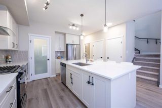 Photo 10: 122 Magnolia Court SE in Calgary: Mahogany Detached for sale : MLS®# A2124705