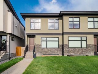 Photo 1: 2016 32 Street SW in Calgary: Killarney/Glengarry Semi Detached for sale : MLS®# A1209622