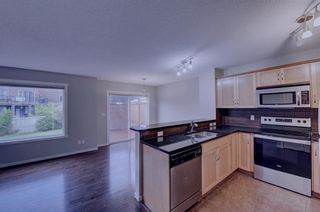 Photo 8: 151 Panatella Drive NW in Calgary: Panorama Hills Semi Detached (Half Duplex) for sale : MLS®# A1254576