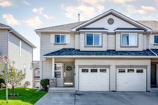 Photo 1: 92 Rocky Vista Circle NW in Calgary: Rocky Ridge Row/Townhouse for sale : MLS®# A2079391