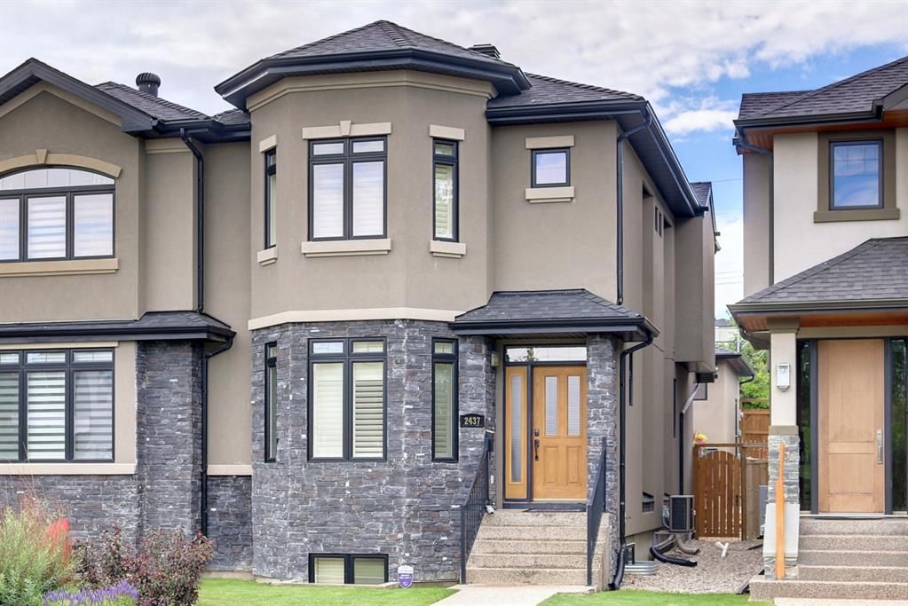 Main Photo: 2437 28 Avenue SW in Calgary: Richmond Semi Detached (Half Duplex) for sale : MLS®# A2009606