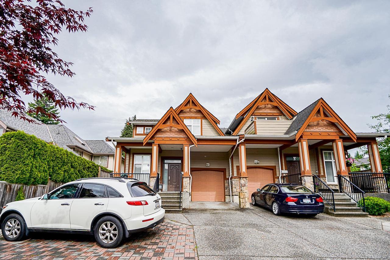 Main Photo: 709 DOGWOOD Street in Coquitlam: Coquitlam West 1/2 Duplex for sale : MLS®# R2594461