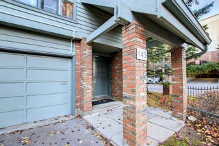 Photo 4: 143 Point Drive NW in Calgary: Point McKay Row/Townhouse for sale : MLS®# A1157621