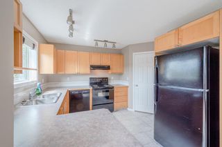 Photo 18: 165 Everstone Drive SW in Calgary: Evergreen Semi Detached (Half Duplex) for sale : MLS®# A1233904