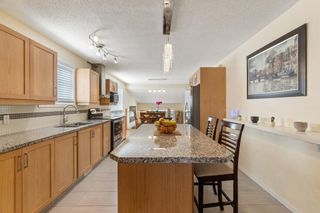 Photo 14: 28 Sandpiper Way NW in Calgary: Sandstone Valley Detached for sale : MLS®# A1201577