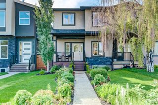 Photo 1: 225 24 Avenue NW in Calgary: Tuxedo Park Semi Detached for sale : MLS®# A1015809
