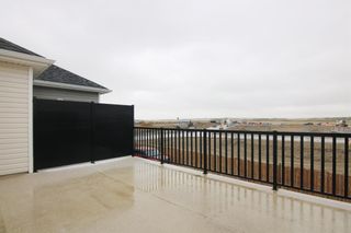 Photo 22: 4140 Windsong Boulevard SW: Airdrie Row/Townhouse for sale : MLS®# A1099382