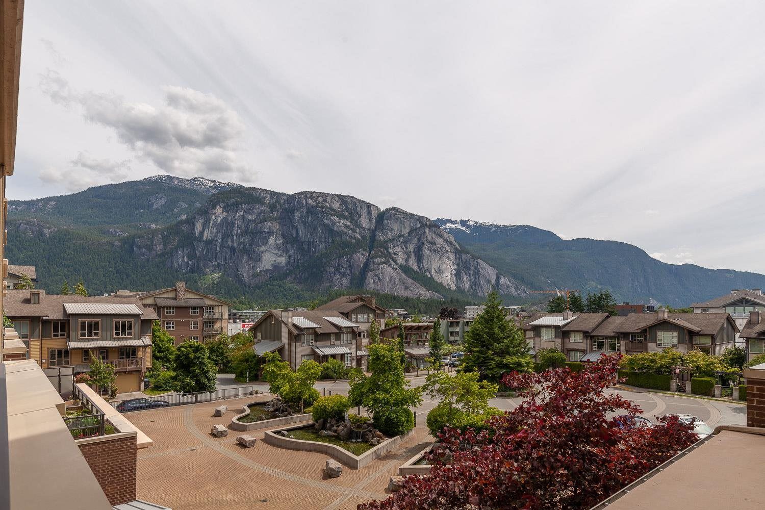 Main Photo: 308 1211 VILLAGE GREEN Way in Squamish: Downtown SQ Condo for sale in "ROCKCLIFF" : MLS®# R2621260