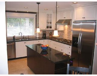 Photo 2: 5591 FRIGATE Road in Ladner: Neilsen Grove House for sale in "MARINA GARDENS" : MLS®# V695573