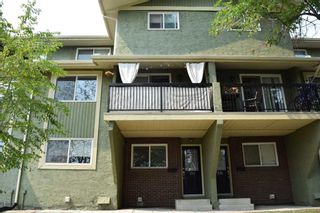 Main Photo: 311 2200 Woodview Drive SW in Calgary: Woodlands Row/Townhouse for sale : MLS®# A2078147
