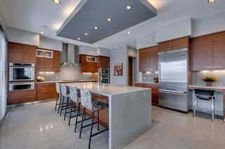 Photo 11: 50 Posthill Drive SW in Calgary: Springbank Hill Detached for sale : MLS®# A1231183