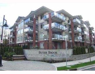Photo 1: 402 100 CAPILANO Road in Port_Moody: Port Moody Centre Condo for sale in "SUTERBROOK" (Port Moody)  : MLS®# V696052