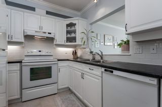 Photo 8: 403 140 E 14TH Street in North Vancouver: Central Lonsdale Condo for sale in "Springhill Place" : MLS®# R2701816