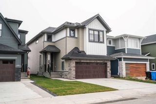 Photo 2: 322 Creekstone Way SW in Calgary: C-168 Detached for sale : MLS®# A2088217