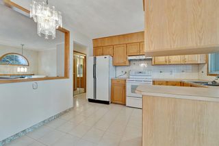 Photo 16: 7740 Hunterquay Road NW in Calgary: Huntington Hills Detached for sale : MLS®# A2021746