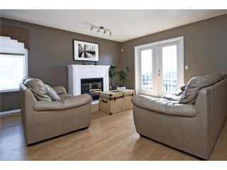 Photo 3: 113 55 FAIRWAYS Drive NW: Airdrie Townhouse for sale : MLS®# C3565868